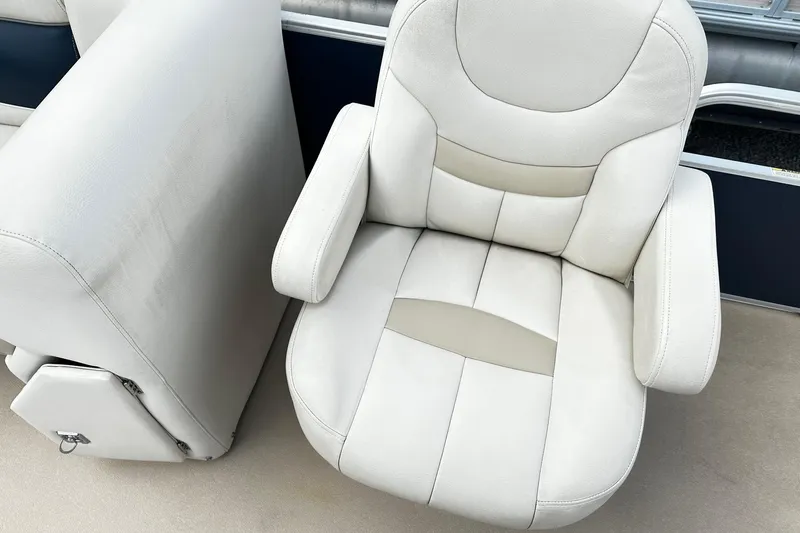 Slide: The Image of 2015 Godfrey 2286 Sweetwater Pontoon boat seat, white and beige upholstery. - 7