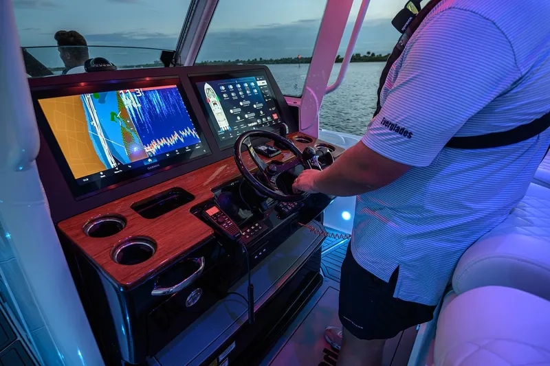 Slide: The Image of Manufacturer Provided Image: 2025 Everglades 375 Center Console boat dashboard with advanced navigation system. - 6