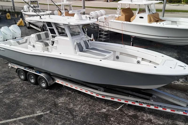 Slide: The Image of 2025 Invincible 36 Open Fisherman boat on trailer, sleek design, ready for adventure. - 0