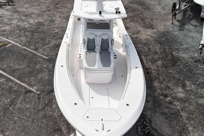 Slide: The Image of 2025 Invincible 36 Open Fisherman boat, aerial view, sleek design, spacious deck. - 10