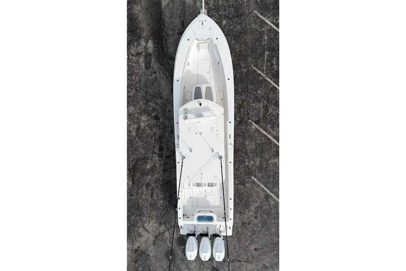 Slide: The Image of Aerial view of 2025 Invincible 36 Open Fisherman boat on concrete surface. - 11