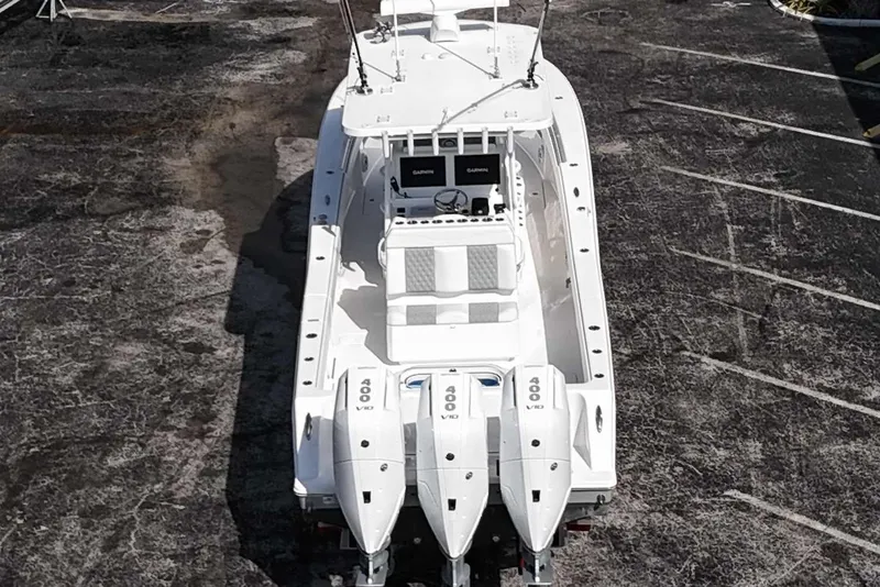 Slide: The Image of 2025 Invincible 36 Open Fisherman boat with triple 400 V10 engines, aerial view. - 18