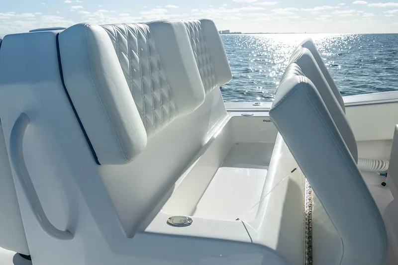 Slide: The Image of Manufacturer Provided Image: 2025 Invincible 36 Open Fisherman boat seats with ocean view. - 4