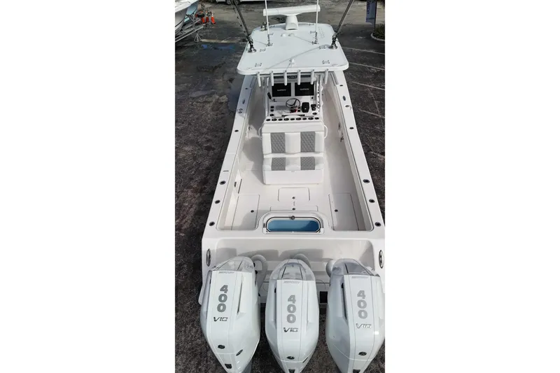 Slide: The Image of 2025 Invincible 36 Open Fisherman boat with triple 400 V10 engines, aerial view. - 9