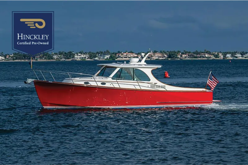 The Image of 2016 Hinckley Talaria 34 boat cruising on water, certified pre-owned. - 0