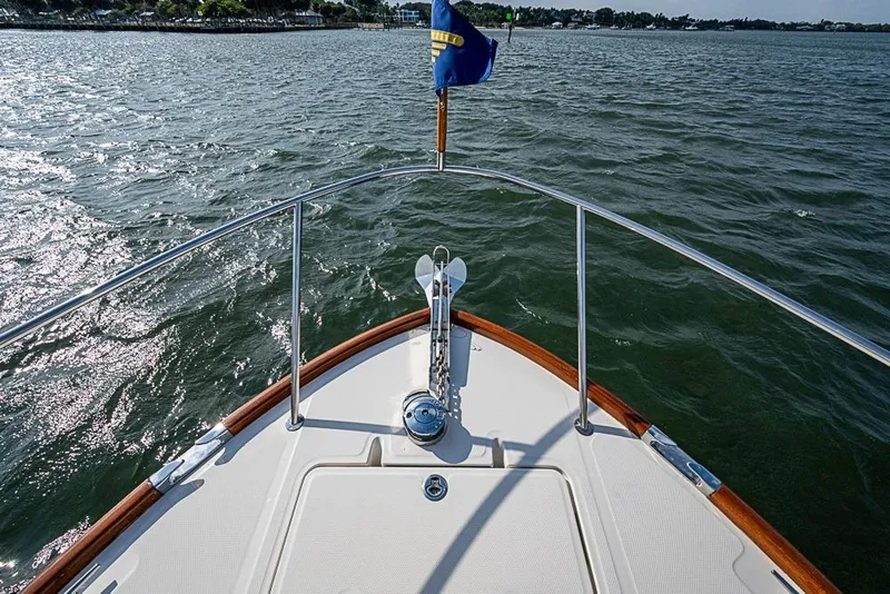Slide: The Image of Bow view of 2016 Hinckley Talaria 34 yacht on open water. - 17