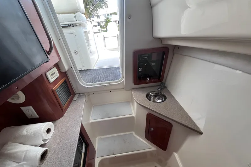 Slide: The Image of Interior of a 2010 World Cat 290 EC boat with sink and countertop. - 22
