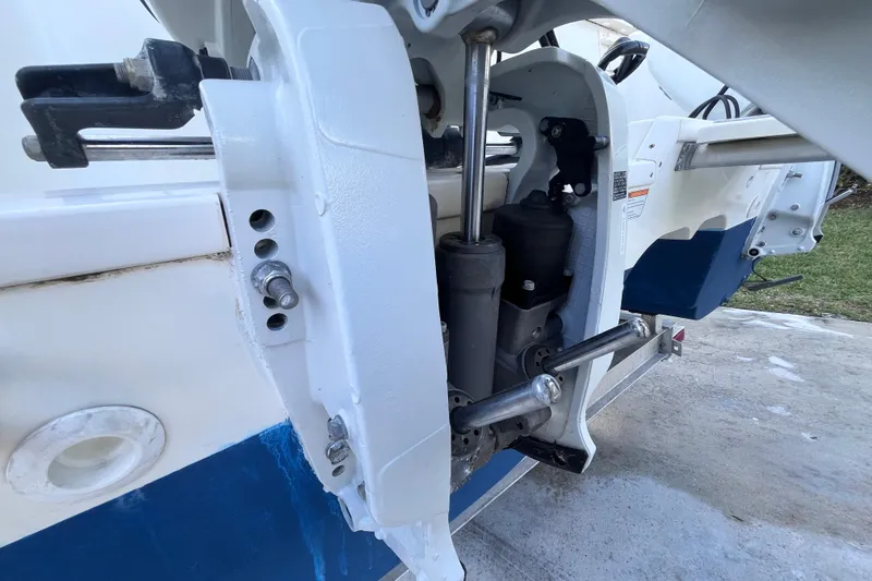 Slide: The Image of Close-up of 2010 World Cat 290 EC boat engine components and hydraulic system. - 67