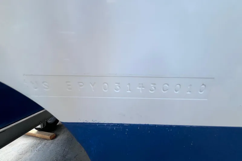 Slide: The Image of Hull identification number on 2010 World Cat 290 EC boat. - 70