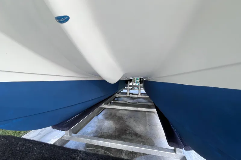 Slide: The Image of Underneath view of 2010 World Cat 290 EC boat hull on trailer. - 71