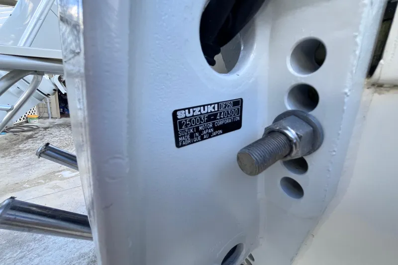 Slide: The Image of Suzuki motor label on 2010 World Cat 290 EC boat, showing model DF250. - 76