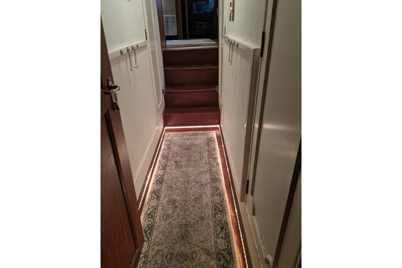 Slide: The Image of Hallway of 1984 Hatteras 53 Extended Deckhouse Motor Yacht with carpet and ambient lighting. - 23