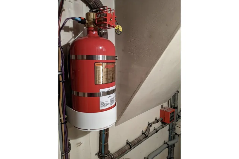 Slide: The Image of Fire suppression system in 1984 Hatteras 53 Extended Deckhouse Motor Yacht engine room. - 43