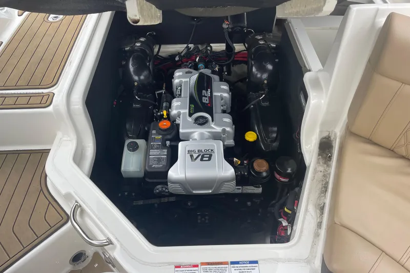 Slide: The Image of Engine compartment of 2021 Sea Ray SLX 250 boat with Big Block V8 engine. - 10