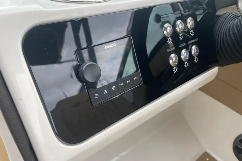 Slide: The Image of Control panel of 2021 Sea Ray SLX 250 boat with Fusion audio system. - 9