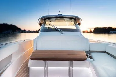Slide: The Image of Open hatch on 2026 Tiara Yachts 39 LS, revealing engine compartment. - 18