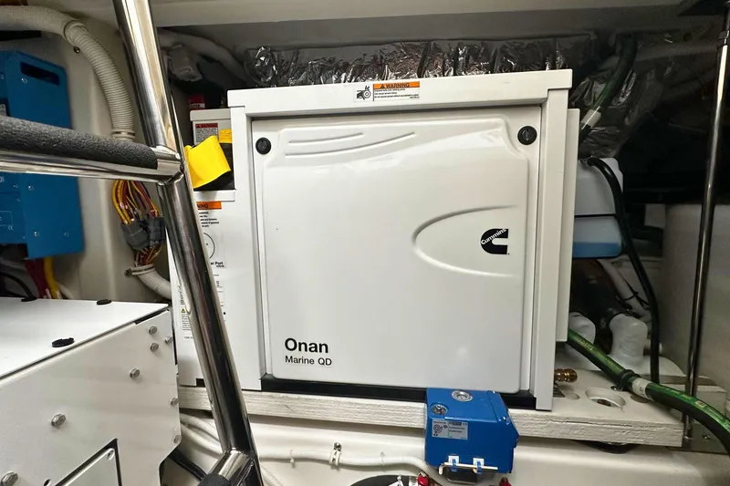 Slide: The Image of Engine room of 2026 Tiara Yachts 39 LS with Onan Marine QD generator. - 20