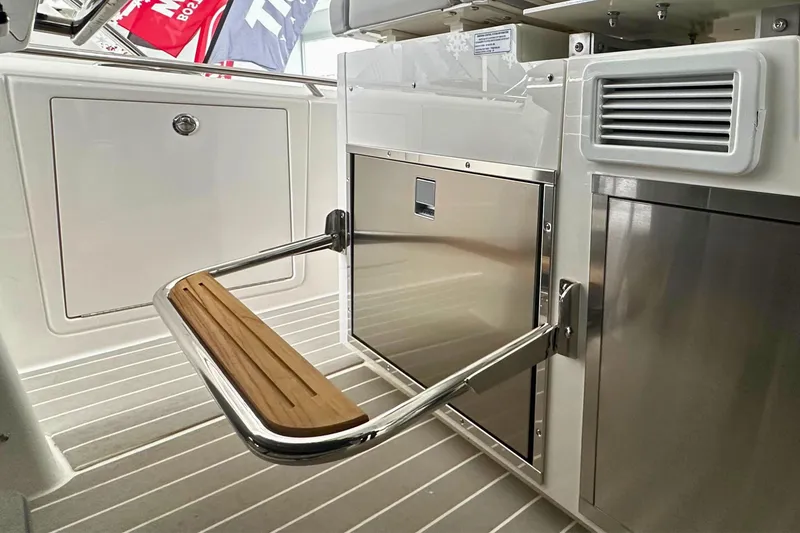Slide: The Image of 2026 Tiara Yachts 39 LS interior with stainless steel and wood accents. - 27