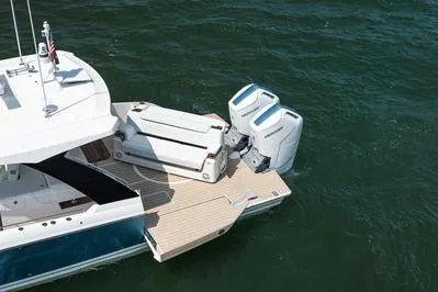 Slide: The Image of 2026 Tiara Yachts 39 LS with dual Mercury Verado engines, rear view. - 3