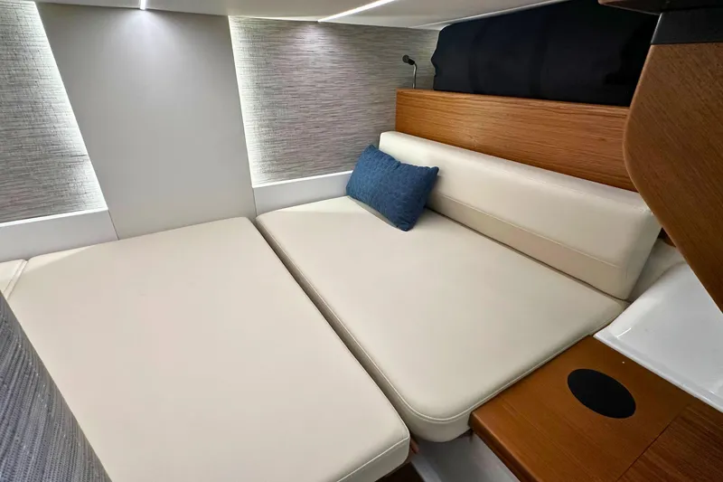 Slide: The Image of Luxurious interior of 2026 Tiara Yachts 39 LS with modern seating and ambient lighting. - 42