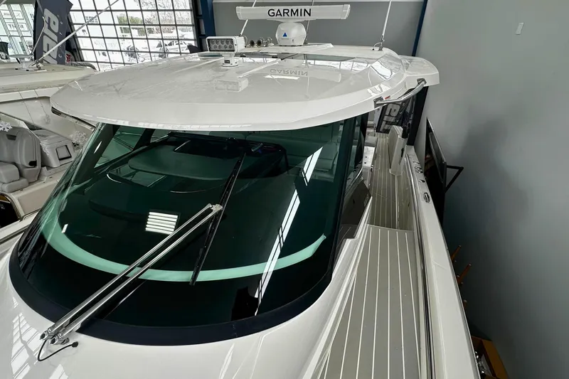 Slide: The Image of 2026 Tiara Yachts 39 LS with Garmin equipment, sleek design, and modern features. - 46