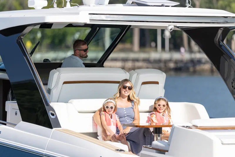 Slide: The Image of 2026 Tiara Yachts 39 LS deck with hose and storage compartment. - 6
