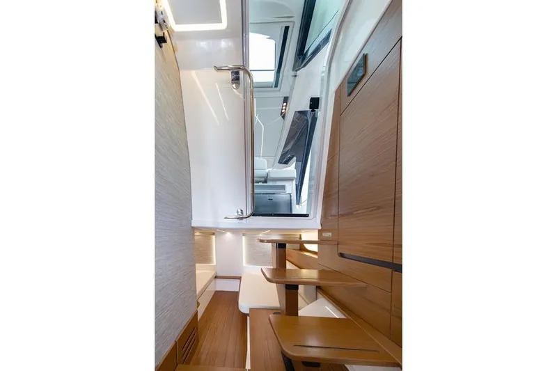 Slide: The Image of 2026 Tiara Yachts 39 LS boat kitchen with grill and storage compartments. - 9