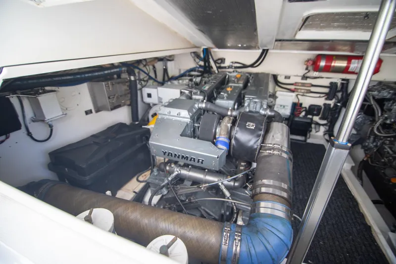 Slide: The Image of Engine room of 2001 Rampage 38 Express with Yanmar engine and equipment. - 27