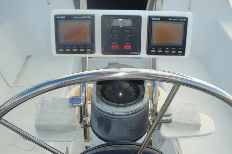 Slide: The Image of Steering wheel and navigation instruments on a 1995 Catalina 270 sailboat. - 10