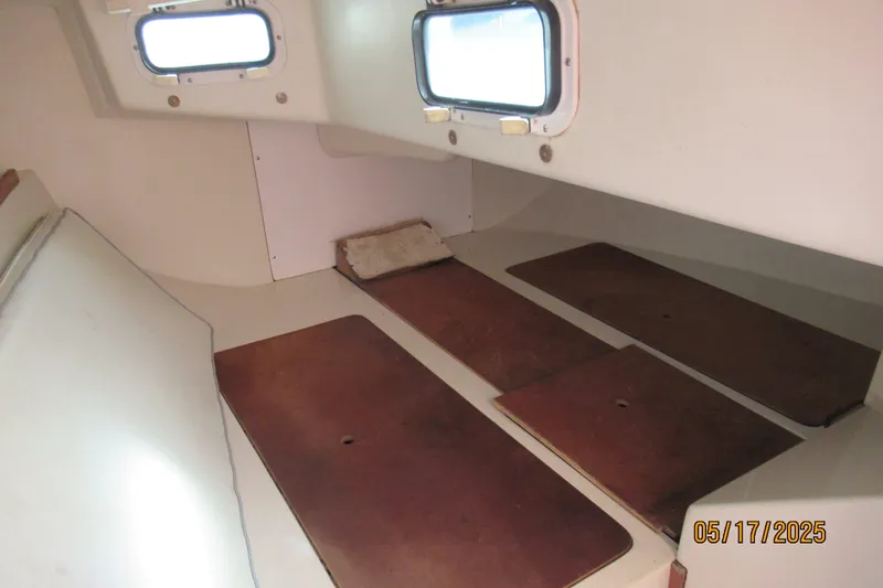 Slide: The Image of Interior cabin of a 1995 Catalina 270 sailboat with wooden flooring. - 3