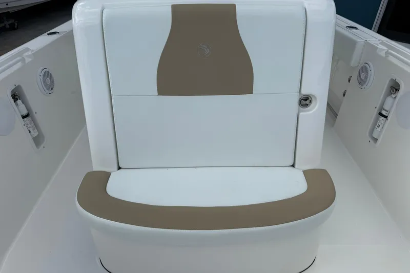 Slide: The Image of 2018 Edgewater 262CC boat seat with beige and white upholstery. - 33