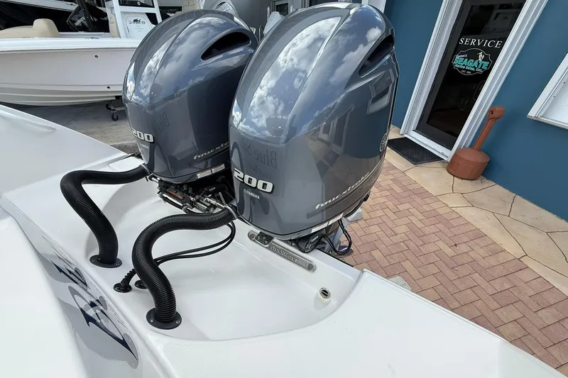 Slide: The Image of 2018 Edgewater 262CC boat with twin Yamaha 200 outboard engines. - 9