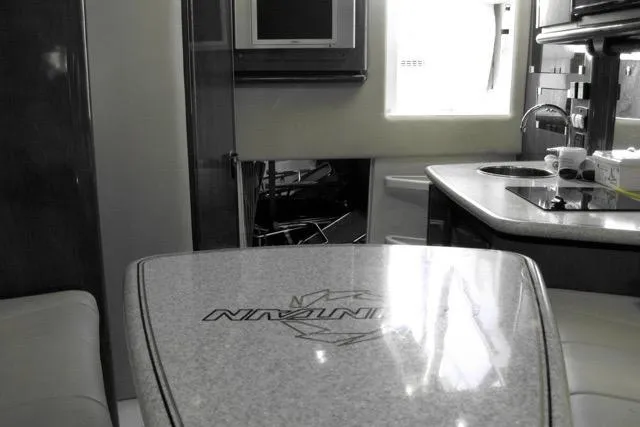 Slide: The Image of 2007 Fountain 33 Sportfish Cruiser in storage, showcasing sleek design and sturdy build. - 14