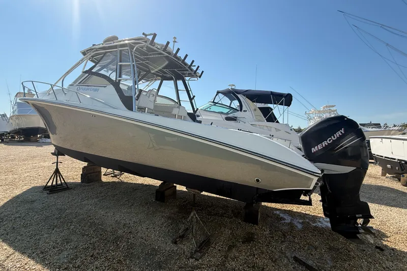 Slide: The Image of 2007 Fountain 33 Sportfish Cruiser with Mercury engines on dry dock. - 25