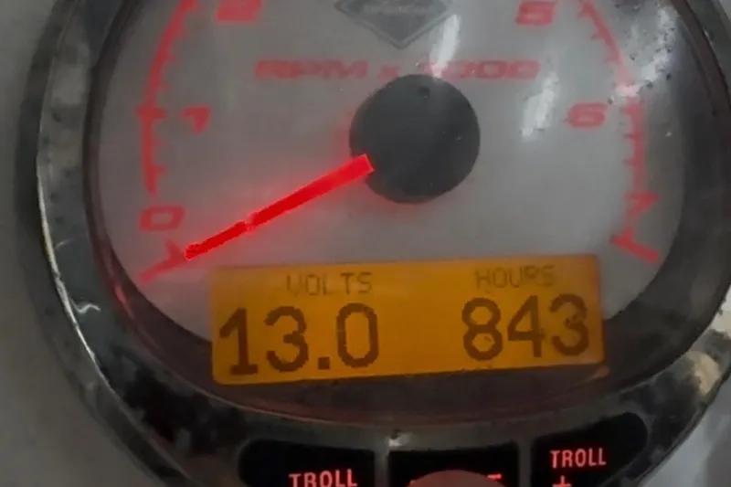 Slide: The Image of Gauge display showing 13 volts and 843 hours on a 2007 Fountain 33 Sportfish Cruiser. - 27