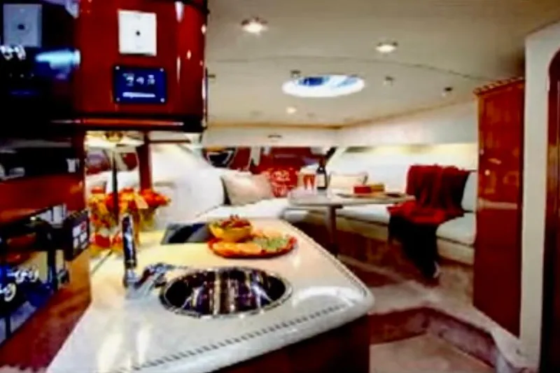 Slide: The Image of Close-up of 2007 Fountain 33 Sportfish Cruiser tachometer showing 12.8 volts and 1056 hours. - 3