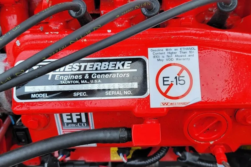 Slide: The Image of 2007 Fountain 33 Sportfish Cruiser docked, equipped with fishing rods and outboard motors. - 7