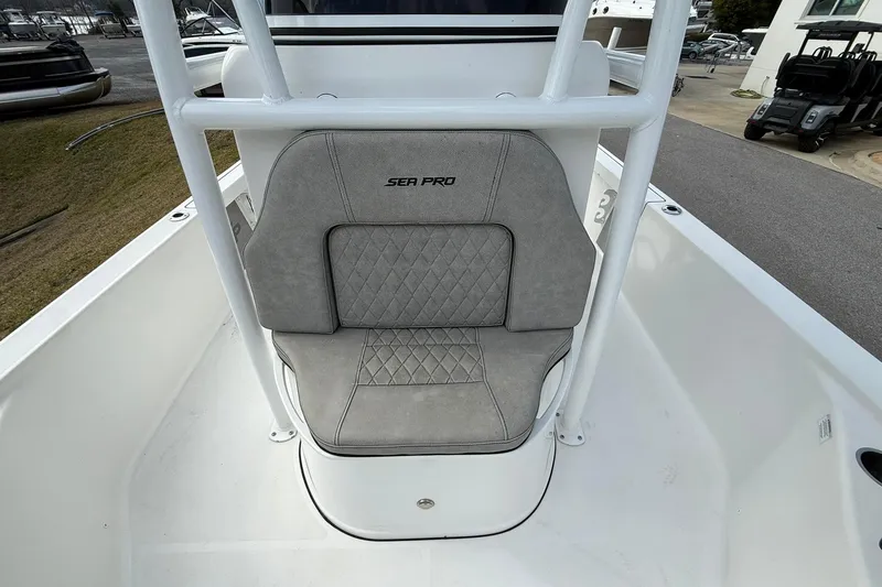 Slide: The Image of 2021 Sea Pro 248 Bay boat seat with gray upholstery and diamond stitching. - 12