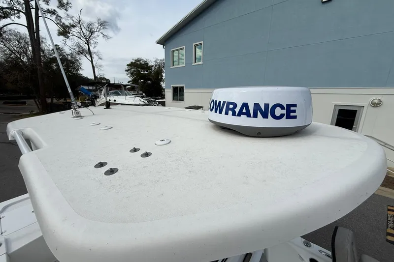 Slide: The Image of 2021 Sea Pro 248 Bay boat with Lowrance radar on top. - 15