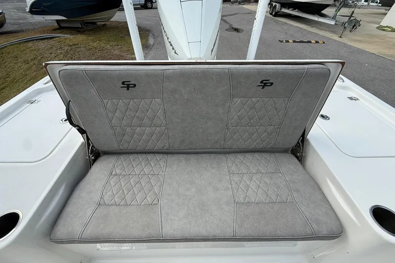 Slide: The Image of 2021 Sea Pro 248 Bay boat with gray cushioned seating and diamond stitching. - 23