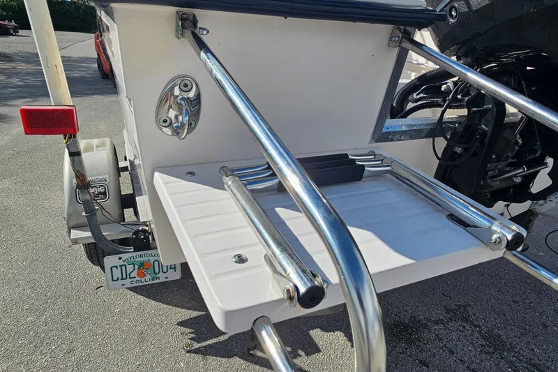 Slide: The Image of 2001 Grady-White Sportsman 180 boat trailer with ladder and license plate. - 10