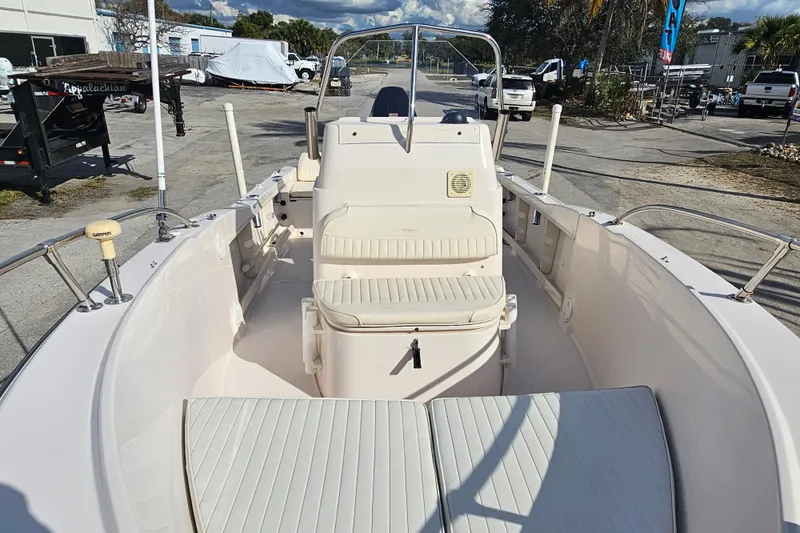 Slide: The Image of 2001 Grady-White Sportsman 180 boat interior with seating and steering console. - 12