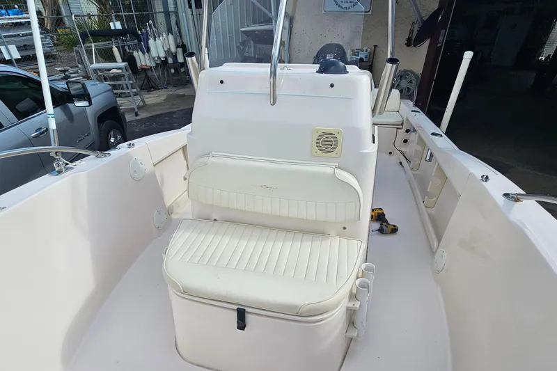 Slide: The Image of 2001 Grady-White Sportsman 180 boat interior with seating and console. - 16