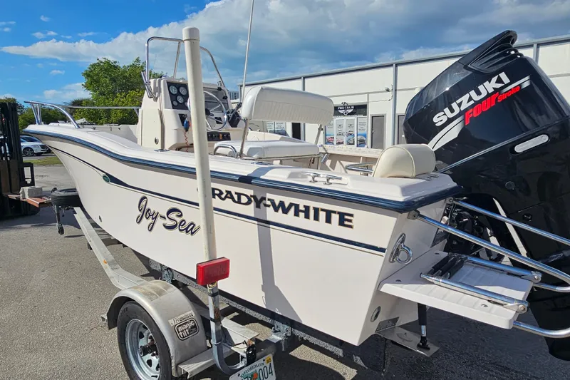 Slide: The Image of 2001 Grady-White Sportsman 180 boat with Suzuki engine on trailer. - 7