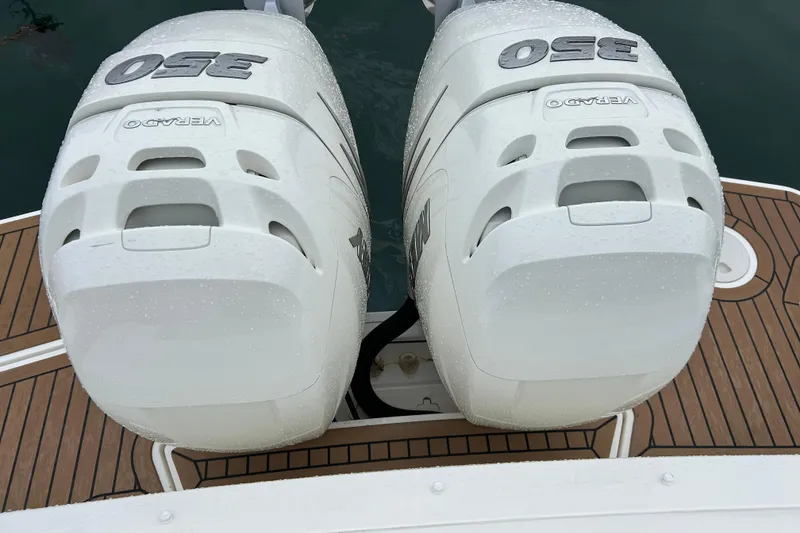 Slide: The Image of Twin 350 Verado engines on a 2022 Boston Whaler 320 Vantage boat. - 8