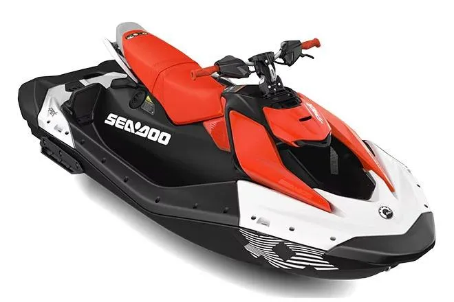 Slide: The Image of Manufacturer Provided Image: 2026 Sea-Doo Spark Trixx for 3, red and black jet ski, side view. - 2