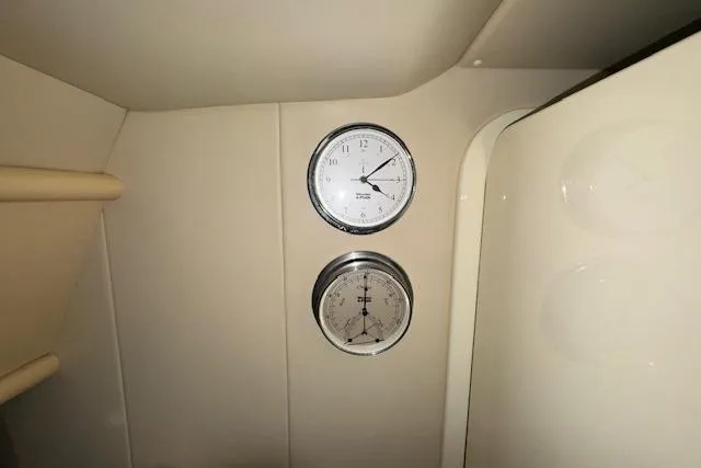 Slide: The Image of Interior of 1994 Sunseeker Apache 45 with wall-mounted clock and barometer. - 21