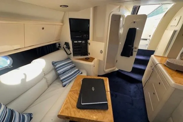 Slide: The Image of Interior of 1994 Sunseeker Apache 45 yacht with cozy seating and modern amenities. - 23