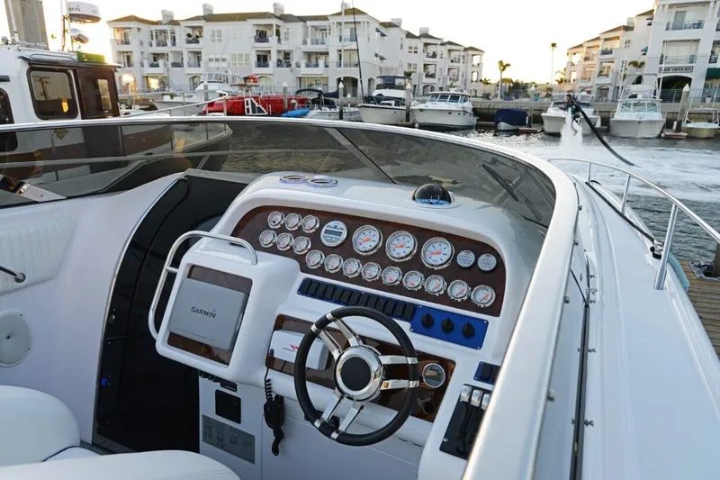 Slide: The Image of Cockpit view of 1994 Sunseeker Apache 45 yacht with modern navigation instruments. - 7