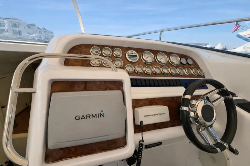 Slide: The Image of 1994 Sunseeker Apache 45 dashboard with Garmin and Standard Horizon equipment. - 8